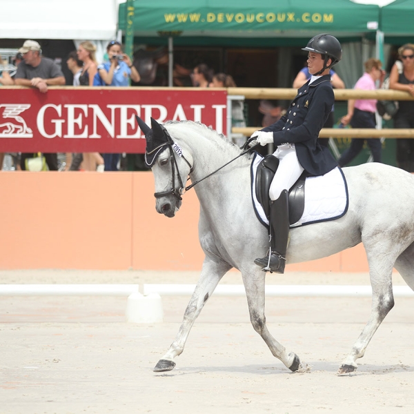 Cheval et sa cavalière lors du Generali Open de France d'équitation